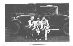 Old car, two people, Diane Kaplan Miller and a dog