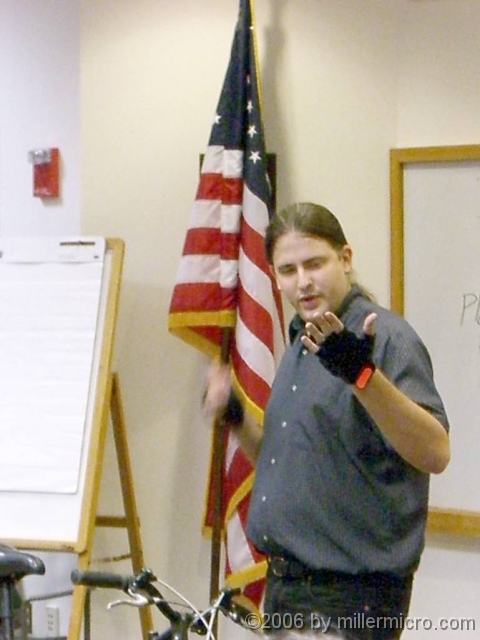 BikeSkillsA5_060715 Jon's gloves add comfort -- AND a reflector strip for added night-time visibility.