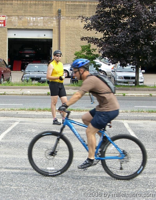 BikeSkillsB3_060715 and then watches each student practice over and over, until they get it right. Here, sitting 'way back for an emergency stop.