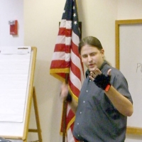 BikeSkillsA5_060715 Jon's gloves add comfort -- AND a reflector strip for added night-time visibility.