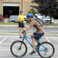 BikeSkillsB3_060715 and then watches each student practice over and over, until they get it right. Here, sitting 'way back for an emergency stop.