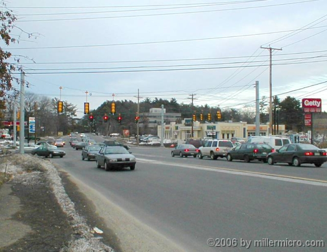 010316Rte30Speen2 At the same intersection. That green is the day-use area of Cochituate State Park, beyond the CRT in the distance. It's a welcome oasis here.