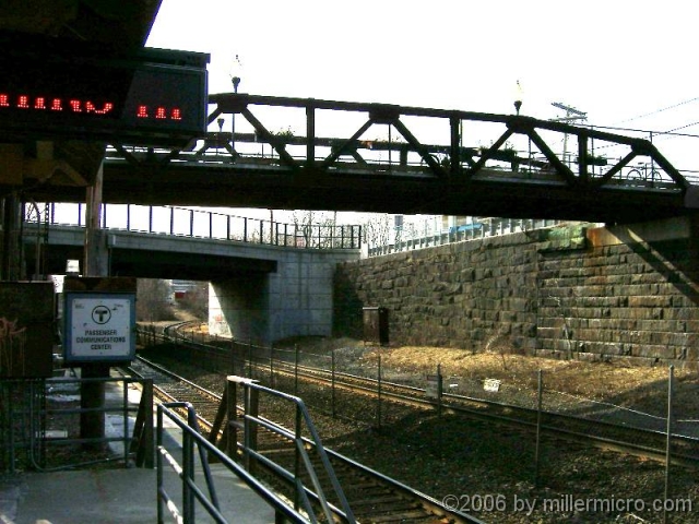 040424NatickRRSta Down on the Natick Commuter Rail platform, looking west .