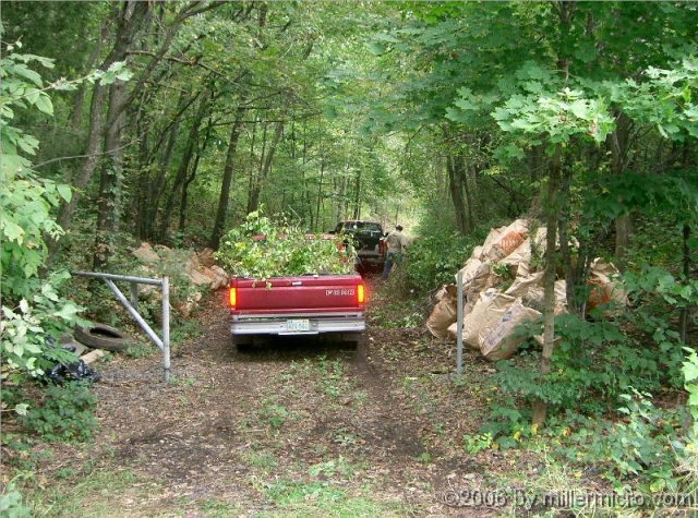 041002CRTCleanUp3 Volunteers with pickup trucks are particularly important during CRT clean-ups.