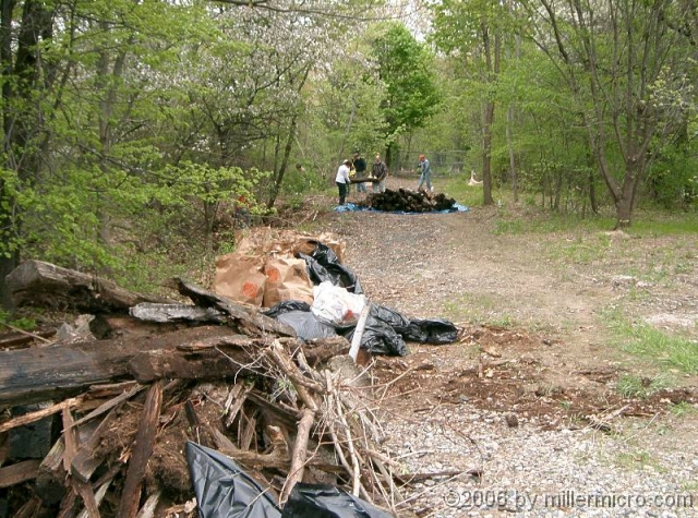 050514CRTCleanUp1 And the Framingham DPW provides Monday pick-up of the piled-up brush and trash.