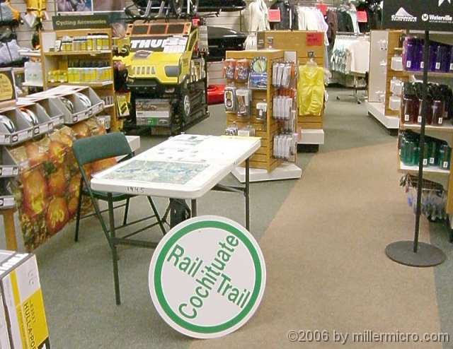 061019CRTTableAtEMS At a sale event, Eastern Mountain Sports hosts an exhibit and volunteer sign-up table for the Cochituate Rail Trail.
