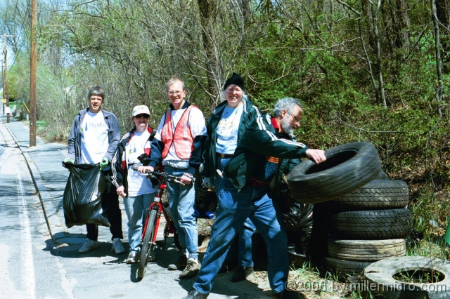 CRTtiretoss010428 PART 5 - Trail Clearing and Maintenance.
In 2001, a first clean-up of the CRT south of Old Connecticut Path found a lot of tires downhill from a car-repair buiding. Abandoned rail lines become dumps.