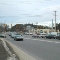 010316Rte30Speen2 At the same intersection. That green is the day-use area of Cochituate State Park, beyond the CRT in the distance. It's a welcome oasis here.