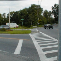 010818NorthEndOfCRT Let's head back from the northeast end of the CRT, at School and Central in Saxonville. The CRT starts at that street sign. The near end of the crosswalk aims right at it; we hope Framingham will line up the far side, as well.