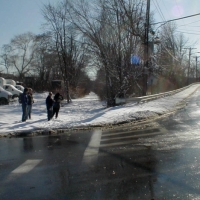020120CRTSchoolSt In snow, that trail and the mis-aligned crosswalk are more obvious than in the prior photo.
