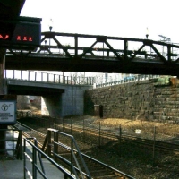 040424NatickRRSta Down on the Natick Commuter Rail platform, looking west .