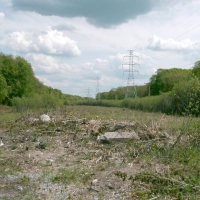 050528NSTARPowerline1-81 PART 9 - NSTAR Power Line 1-81.
Southeast of the Circuit City store in Natick, a great swath of open space someday will provide Framingham and West Natick with an alternate transportation link to Natick Mall and the Cochituate Rail Trail.