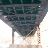 060416Rte9CRTBridge3 The Route 9 bridge is strong enough to hold a locomotive, but it will need paint and a redesigned deck.