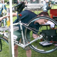 PeterHenryAtTourDeNatick040620 Peter Henry, an owner of Landry's Bicycles, provides free bike tune-ups before the Tour de Natick. Landry's is just one of many businesses that enthusiastically support good local rail trails.