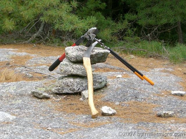 070602ColdRiverCamp_TrailclearingBreak While we pause for some food and rest, our trail-clearing tools also take a break.