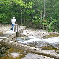 070601ColdRiverCamp_DickOnDam_1024 ..this dam. When closed, it creates a nice swimming hole just upstream. This log hints that there's a lot more water during spring runoff.
