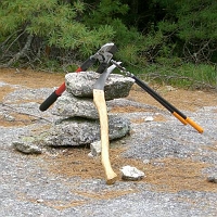 070602ColdRiverCamp_TrailclearingBreak While we pause for some food and rest, our trail-clearing tools also take a break.
