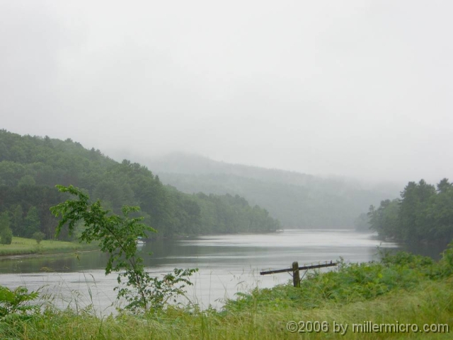 060628MorningMistOnConnecticutRiver On a morning drive south from Fairlee, VT on Route 5, we enjoyed this view of the fog rising off the Connecticut River. Below and nearly out of sight, an old railroad line hugs the near shore.