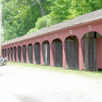 060625LymeNH Behind that church, this lovely shed once sheltered the horses of the parishioners.