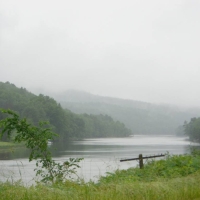 060628MorningMistOnConnecticutRiver On a morning drive south from Fairlee, VT on Route 5, we enjoyed this view of the fog rising off the Connecticut River. Below and nearly out of sight, an old railroad line hugs the near shore.