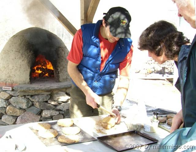 070303BeehiveOven1 an outdoor, beehive oven! As you might guess, this bread is made of whole wheat and is very good!