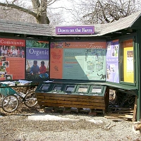 070303FarmSign1 The Natick Community Organic Farm offers lots of enjoyable and educational activities for young and old. Its kiosk is a fine place to start.