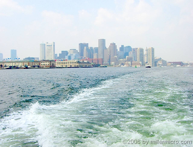 060727BostonSkyline3 We leave Boston behind, and Fish Pier (with the No Name Restaurant) to starboard.