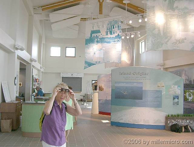 060727SpectacleIsland13 What a handsome building! I'd like a good new headquarters building at Cochituate State Park, one that imparts OUR park's unusual history. But I've been trying for years without success. The Big Dig helped here. Perhaps our MetroWest region should have tried harder, back when the Massachusetts Turnpike was ITS local 