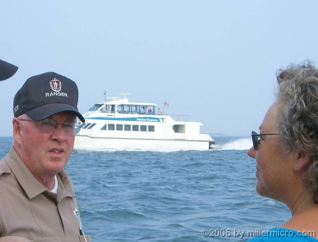 060727SpectacleIsland17 On the ride home, a ranger tells us about the other harbor traffic.