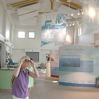 060727SpectacleIsland13 What a handsome building! I'd like a good new headquarters building at Cochituate State Park, one that imparts OUR park's unusual history. But I've been trying for years without success. The Big Dig helped here. Perhaps our MetroWest region should have tried harder, back when the Massachusetts Turnpike was ITS local 